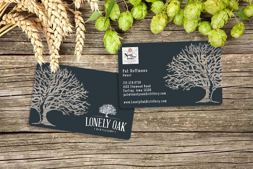 Clear business cards with a clear logo for a distillery