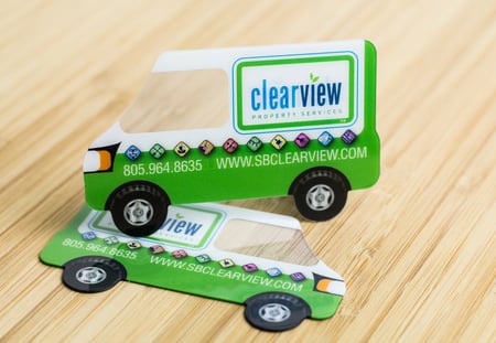 Example of a special shaped business card with a unique design to showcase clear areas such as the windshield.