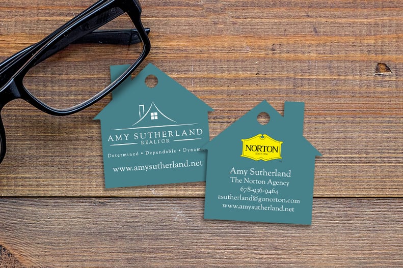 Amy Sutherland Realtor business cards house shaped plastic key tags 