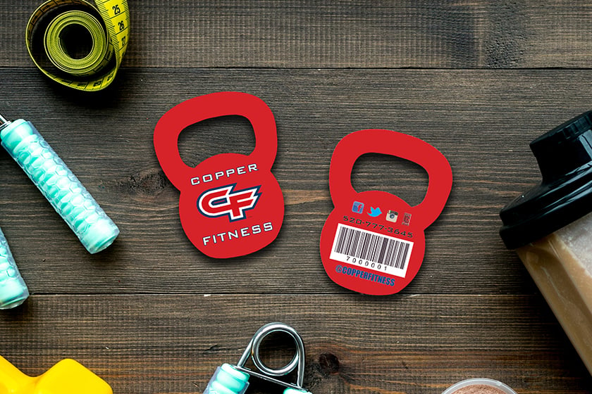 Gym membership cards shaped like a kettlebell