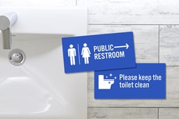 Custom plastic signs for a public bathroom