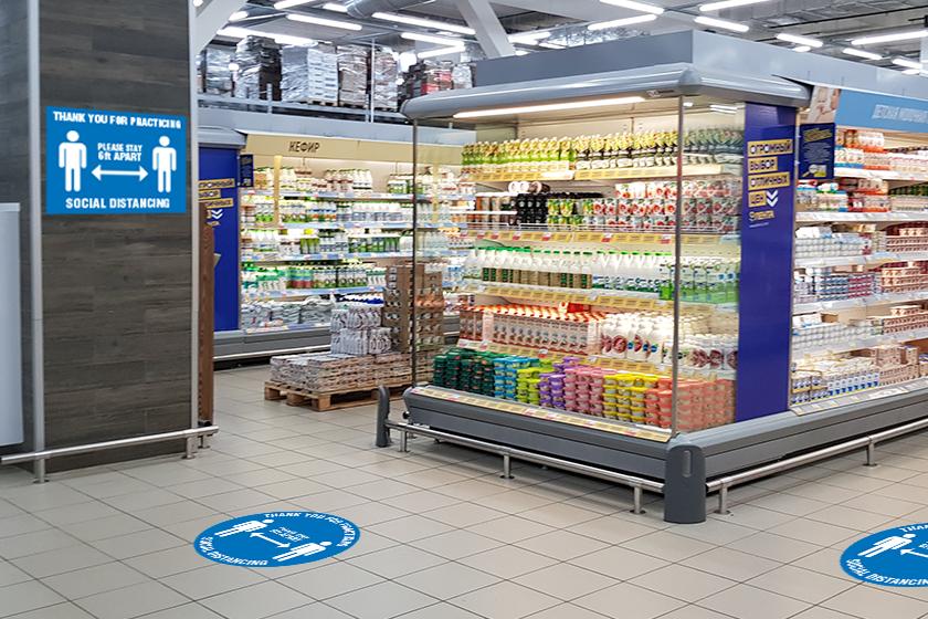Custom floor decal and social distancing signage