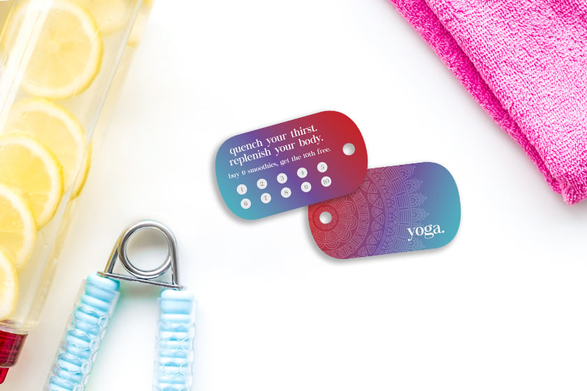 Plastic key tags with punches for tracking customer loyalty