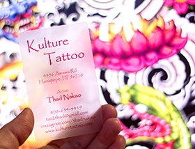 Example of a frosted plastic business card for a tattoo parlour.