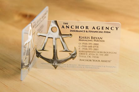 Example of a clear plastic business card printed by Plastic Printers for Anchor Insurance Agency