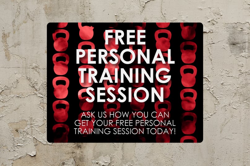 Sign advertising a free personal training session at a gym
