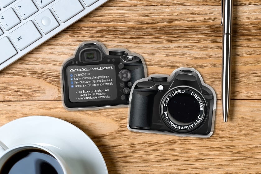 Custom shaped business cards in camera shape for a photographer