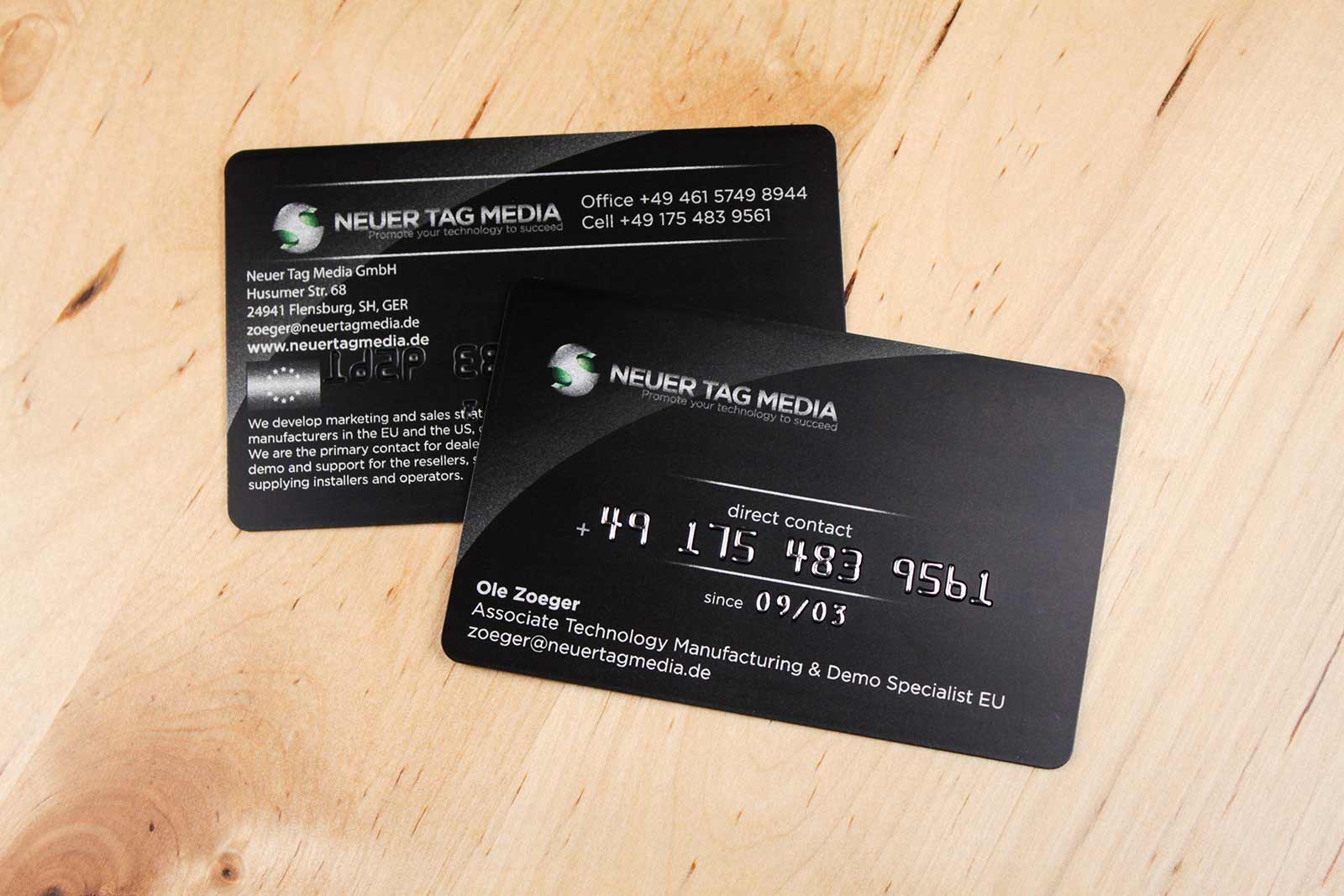 Neuer Tag Media Embossed Business Cards